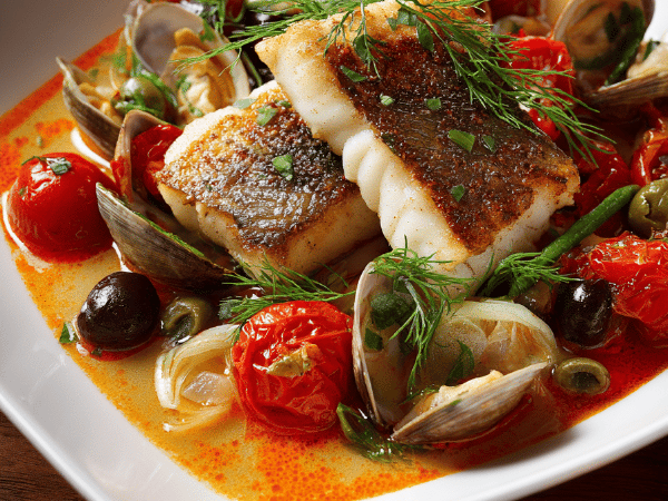 Dorade und Venusmuscheln sicilianisch